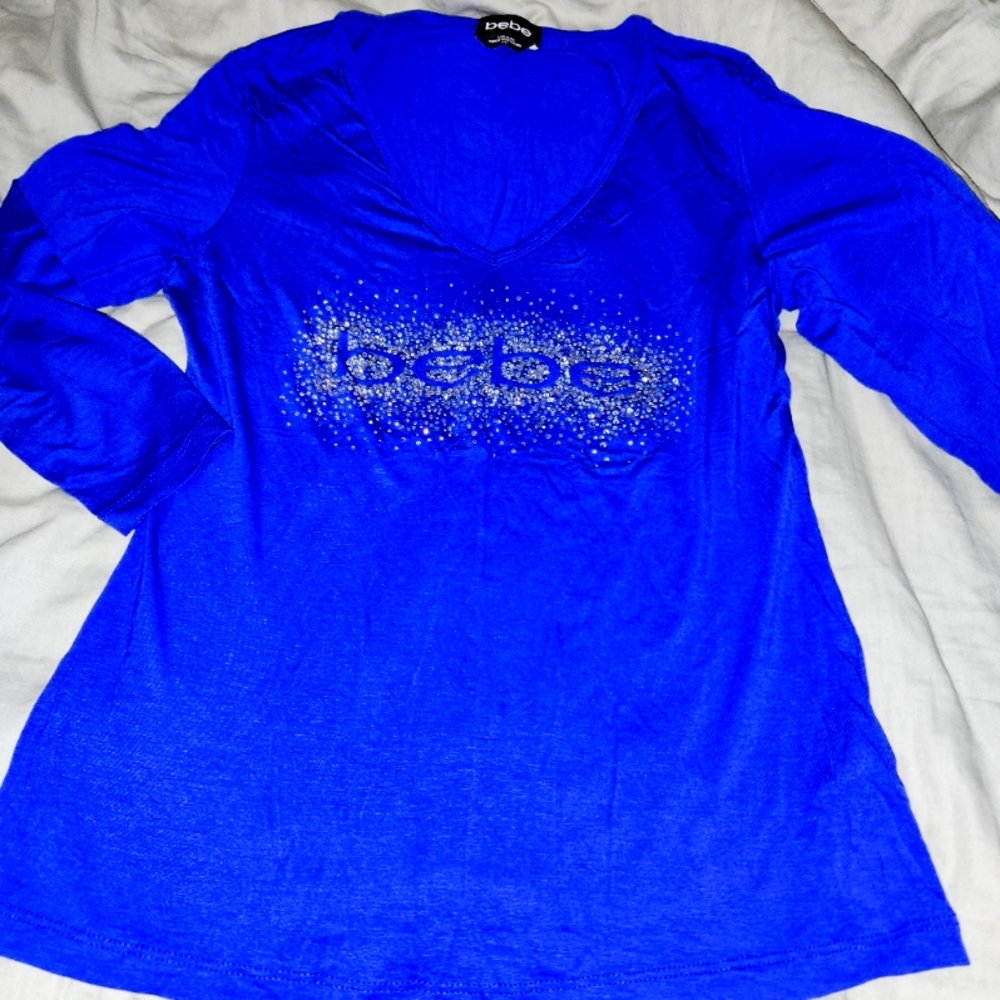 New bebe strech shirt
